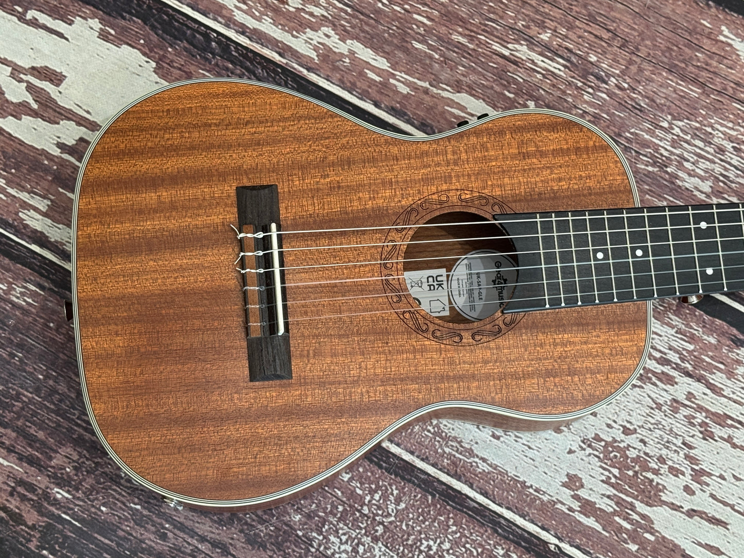 Guitar-Uke - small guitar type thing! Electro acoustic