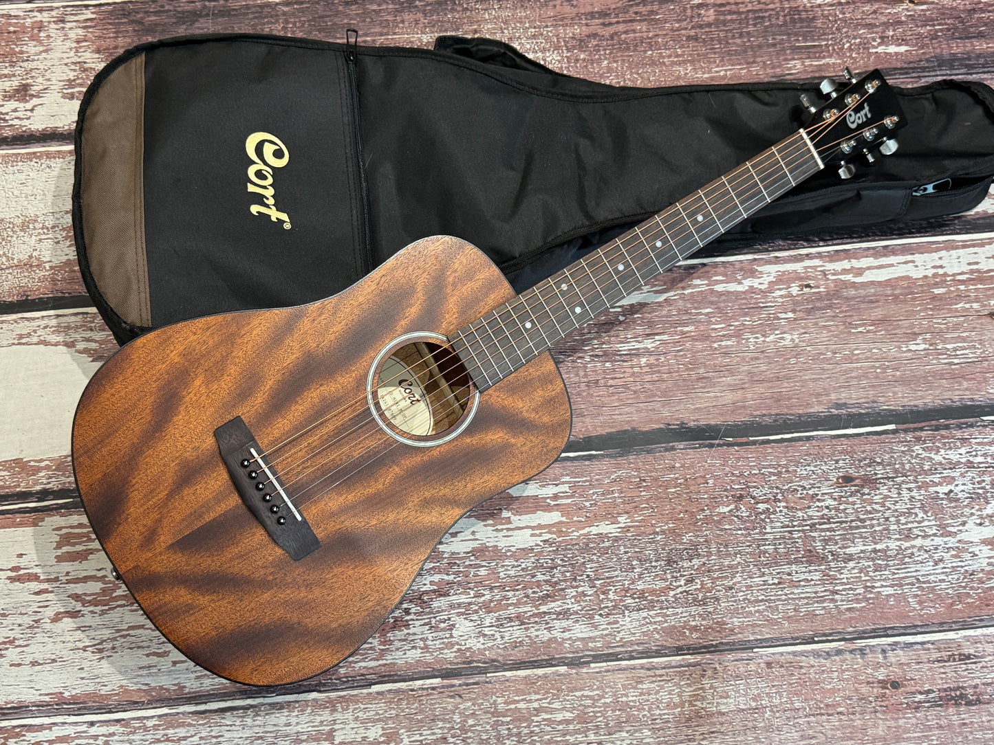 Cort AD Mini Mahogany travel acoustic.