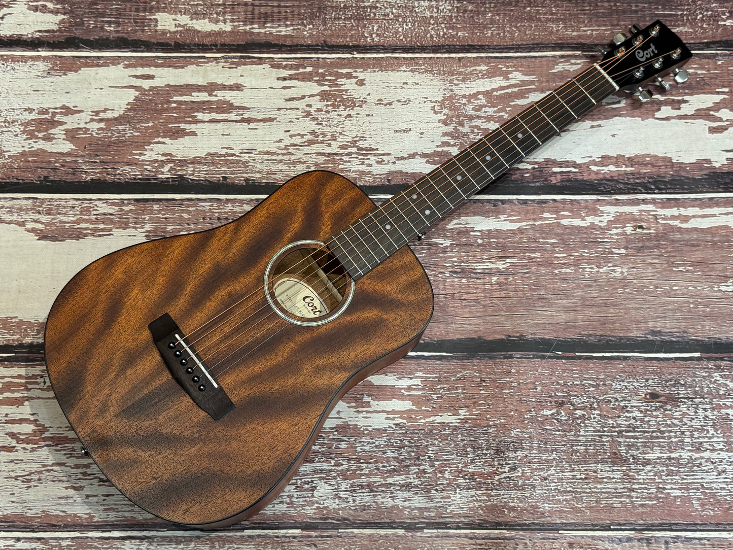 Cort AD Mini Mahogany travel acoustic.