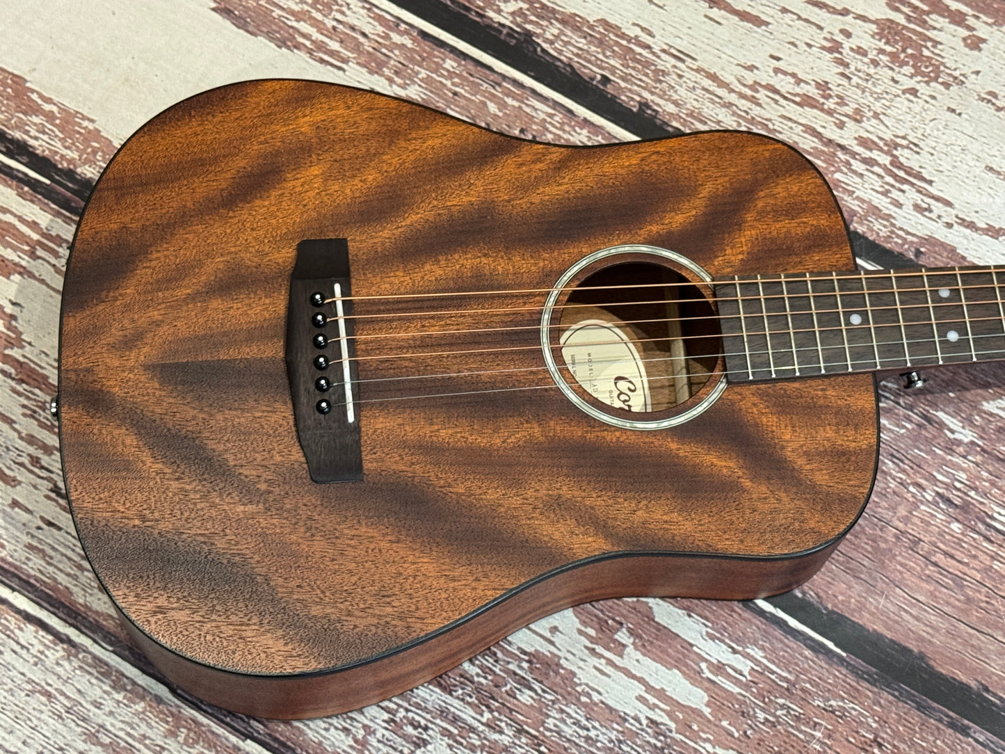 Cort AD Mini Mahogany travel acoustic.