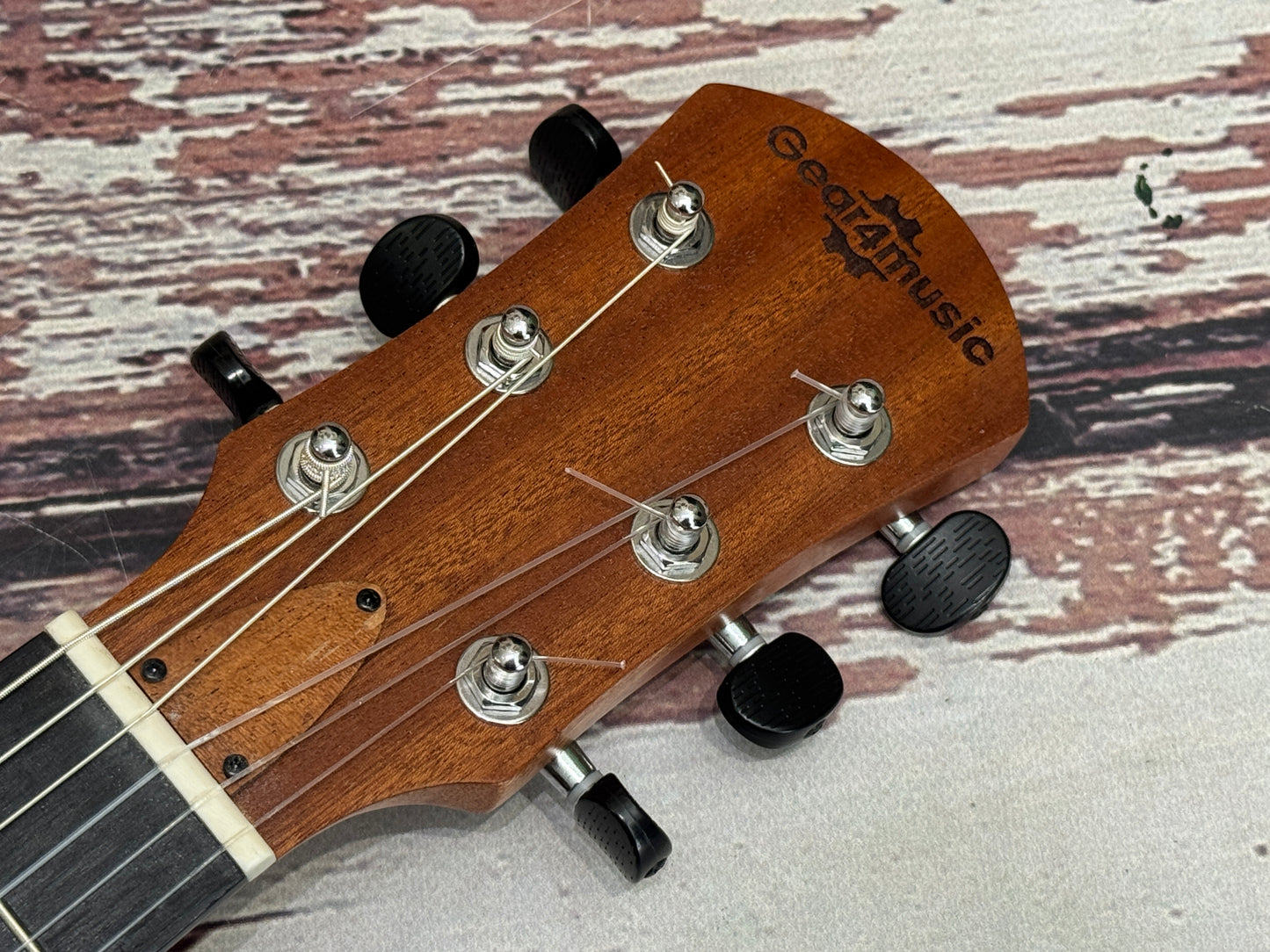 Guitar-Uke - small guitar type thing! Electro acoustic