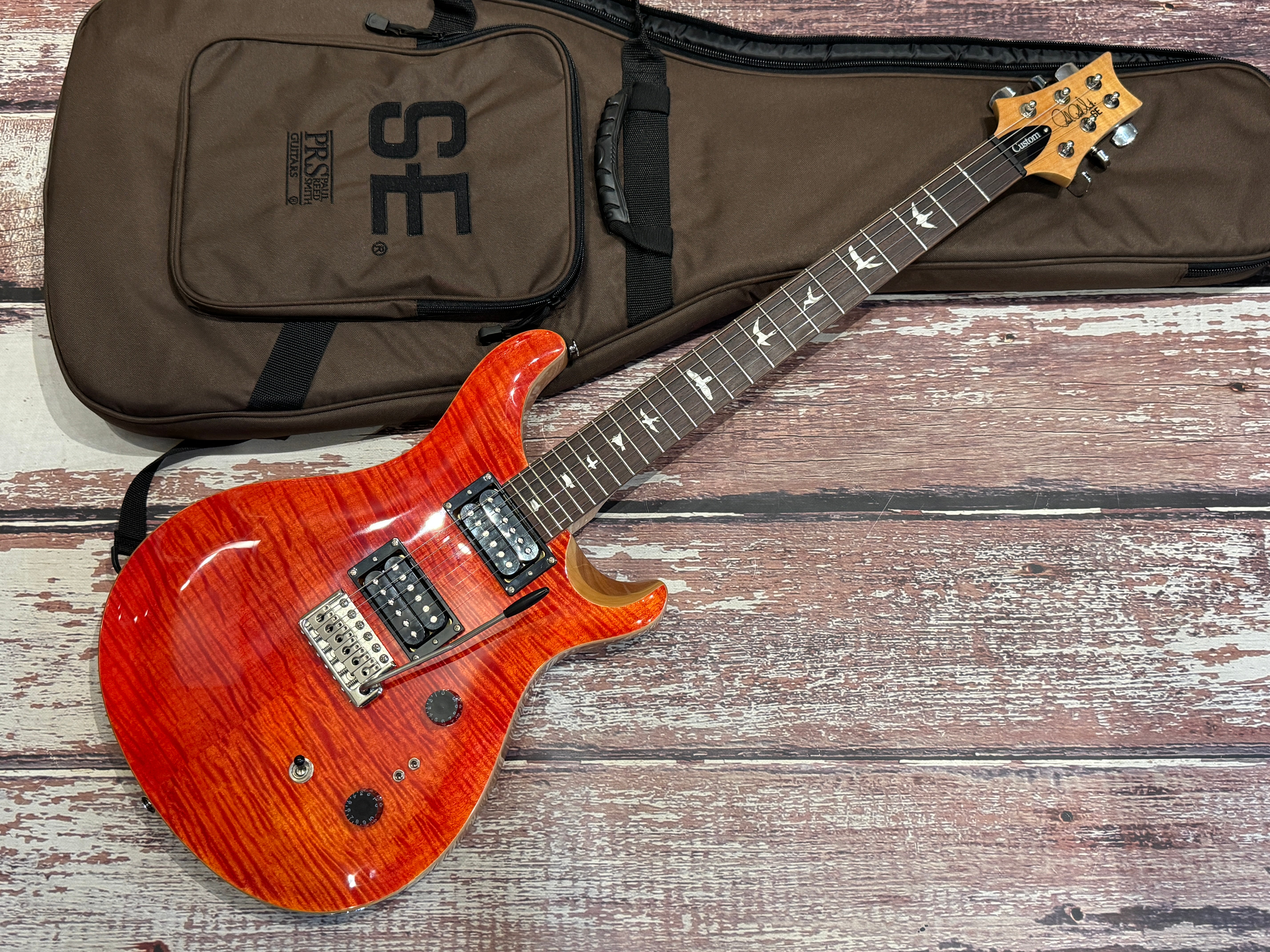 PRS SE Custom 24-08 Blood Orange - Like new! – Badlands Guitars