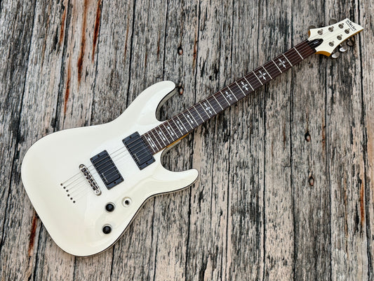 Schecter Demon 6 - Battered Bruised and Battle weary.