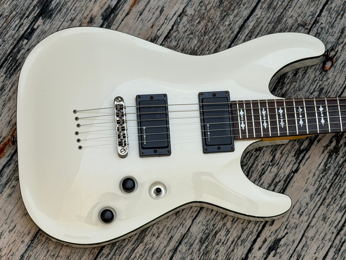 Schecter Demon 6 - Battered Bruised and Battle weary.