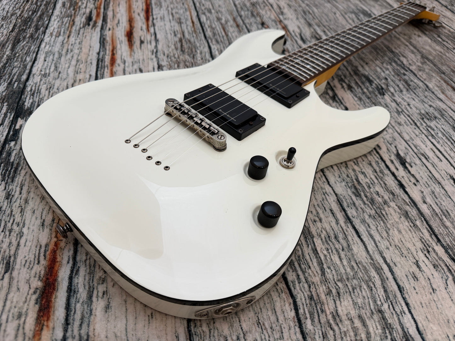 Schecter Demon 6 - Battered Bruised and Battle weary.