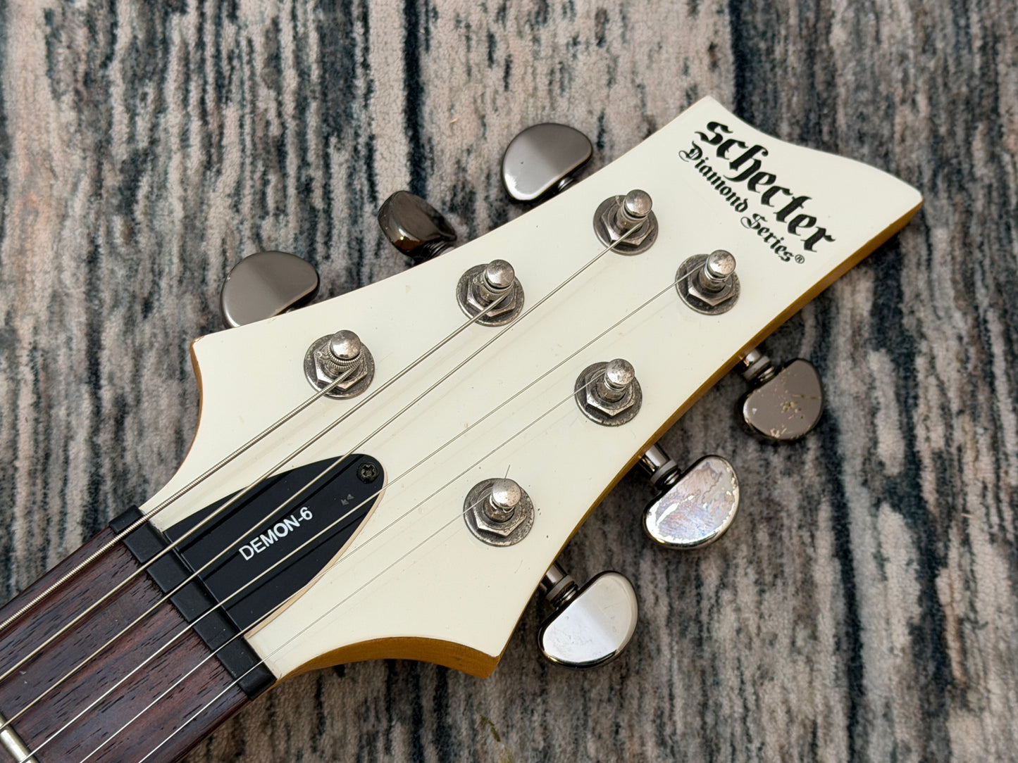 Schecter Demon 6 - Battered Bruised and Battle weary.